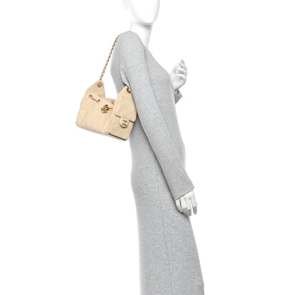 Caviar Quilted Mini Chanel 25 Handbag Beige