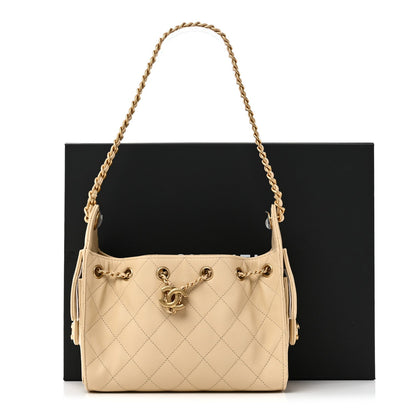 Caviar Quilted Mini Chanel 25 Handbag Beige