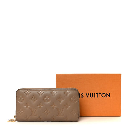 Lambskin Embossed Monogram Coussin Zippy Wallet Taupe