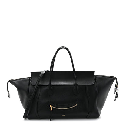Supple Shiny Lambskin Medium Smiling New Luggage Black