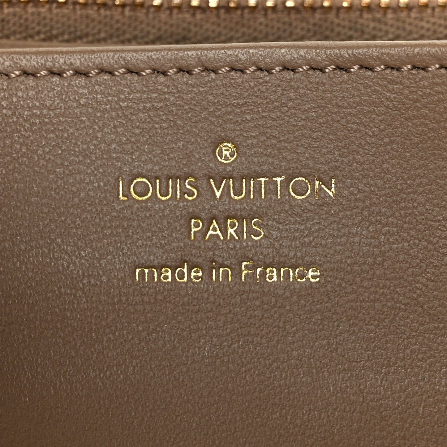 Lambskin Embossed Monogram Coussin Zippy Wallet Taupe