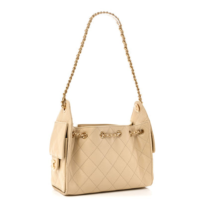 Caviar Quilted Mini Chanel 25 Handbag Beige