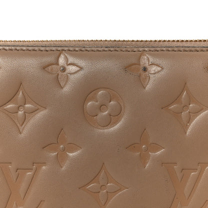 Lambskin Embossed Monogram Coussin Zippy Wallet Taupe